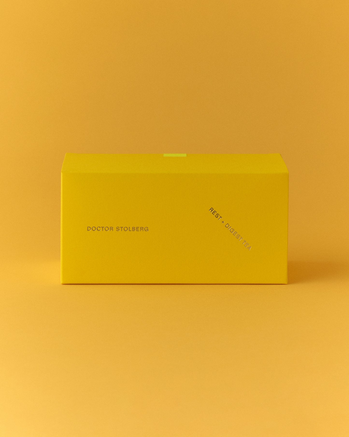 Rest + Digest Tea box on a yellow background