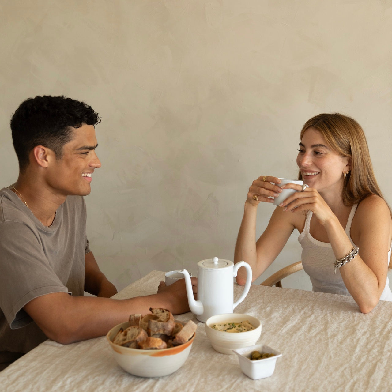 Two people drinking de-bloating and digestive tea