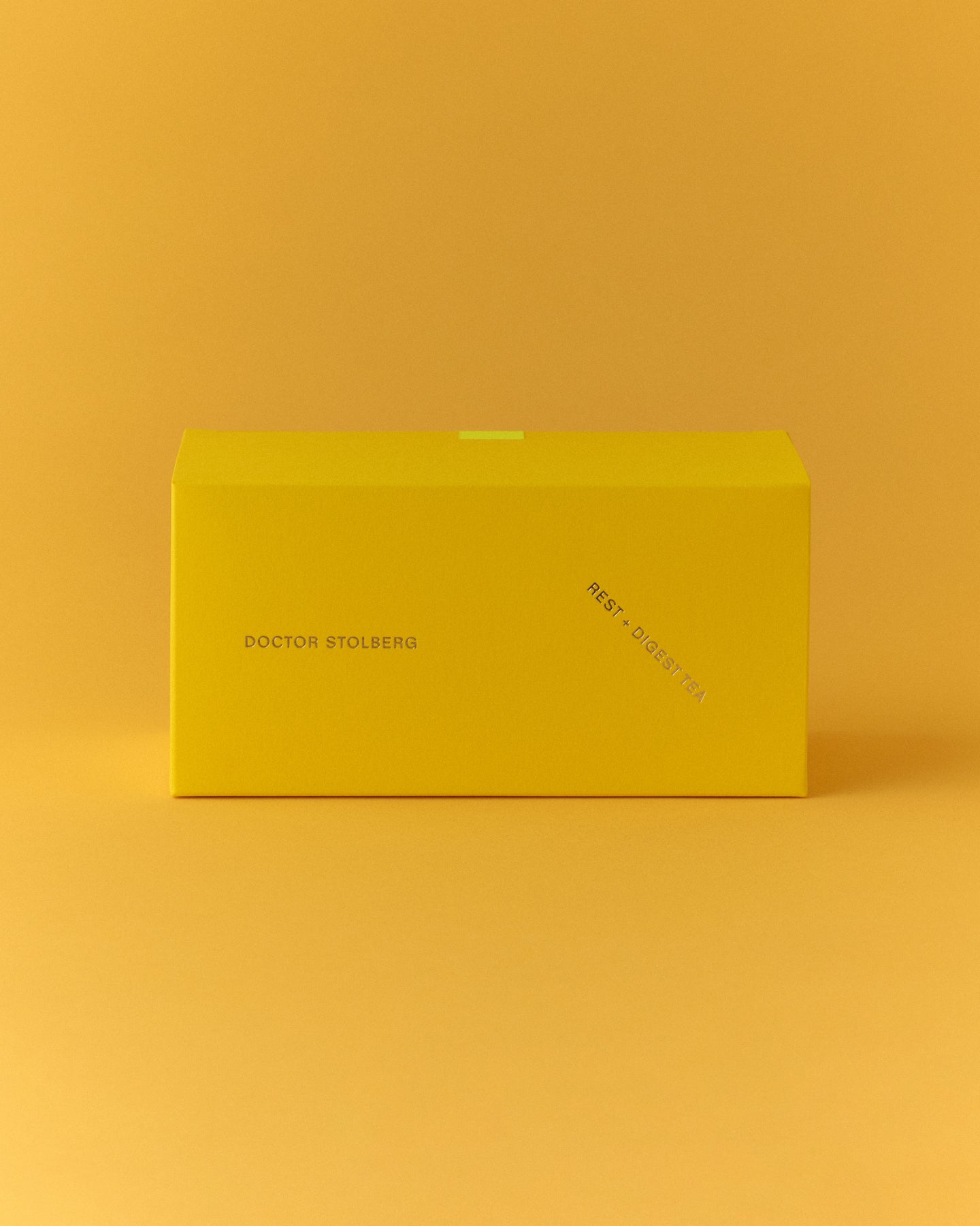 Rest + Digest Tea box on a yellow background